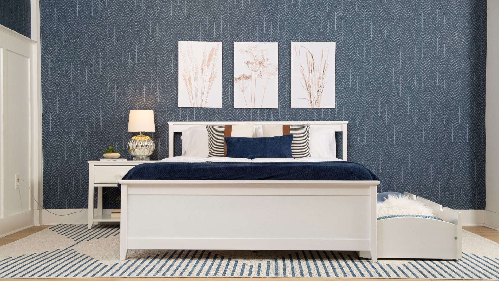 Solid wood white queen bed with underbed storage drawers and white nightstand